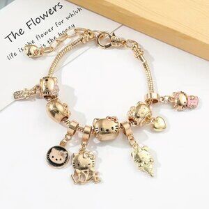 SOLD- Hello Kitty Charm Bracelet Fashion Jewelry Gold Tone